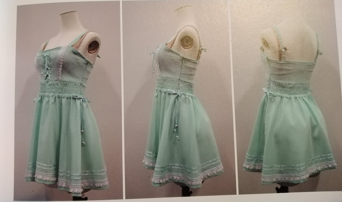 Tifa's green dress from the costume page. The comment speaks of creating a girlish silhouette and when they found the fabric too thin, made adjustments to the design.