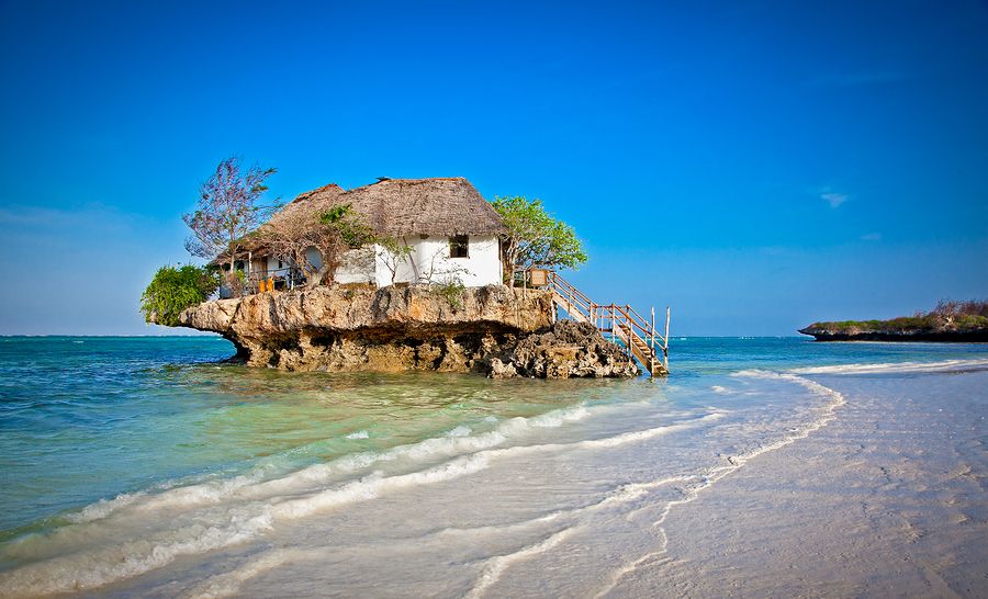 AdrVacations's tweet photo. As you may have guessed, this is The Rock (restaurant) on the island of Zanzibar. Not far from the shore of beautiful Michanwi Pingwe beach, it's one of those experiences that won't disappoint. 
#travel #wanderlust #adventure # #trip  #vacation #explore  #Tanzania #Zanzibar https://t.co/0deCUzdwiZ