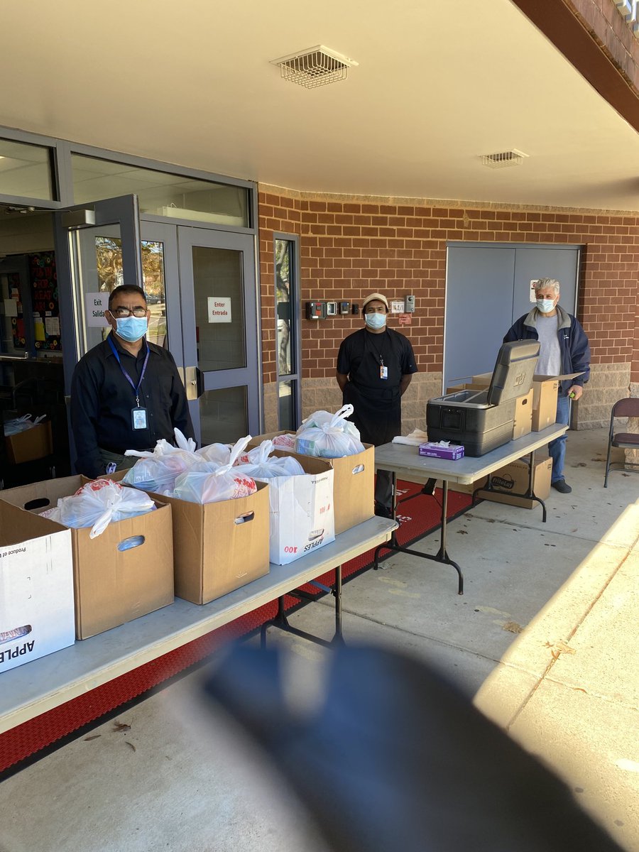 Drew staff w/ help from transportation staff preparing for food distribution.  Thank you