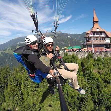 Paraglide above the Swiss Alp peaks on a tandem flight with transport from Interlaken. For more pictures and information visit the link below viator.com/tours/Interlak…