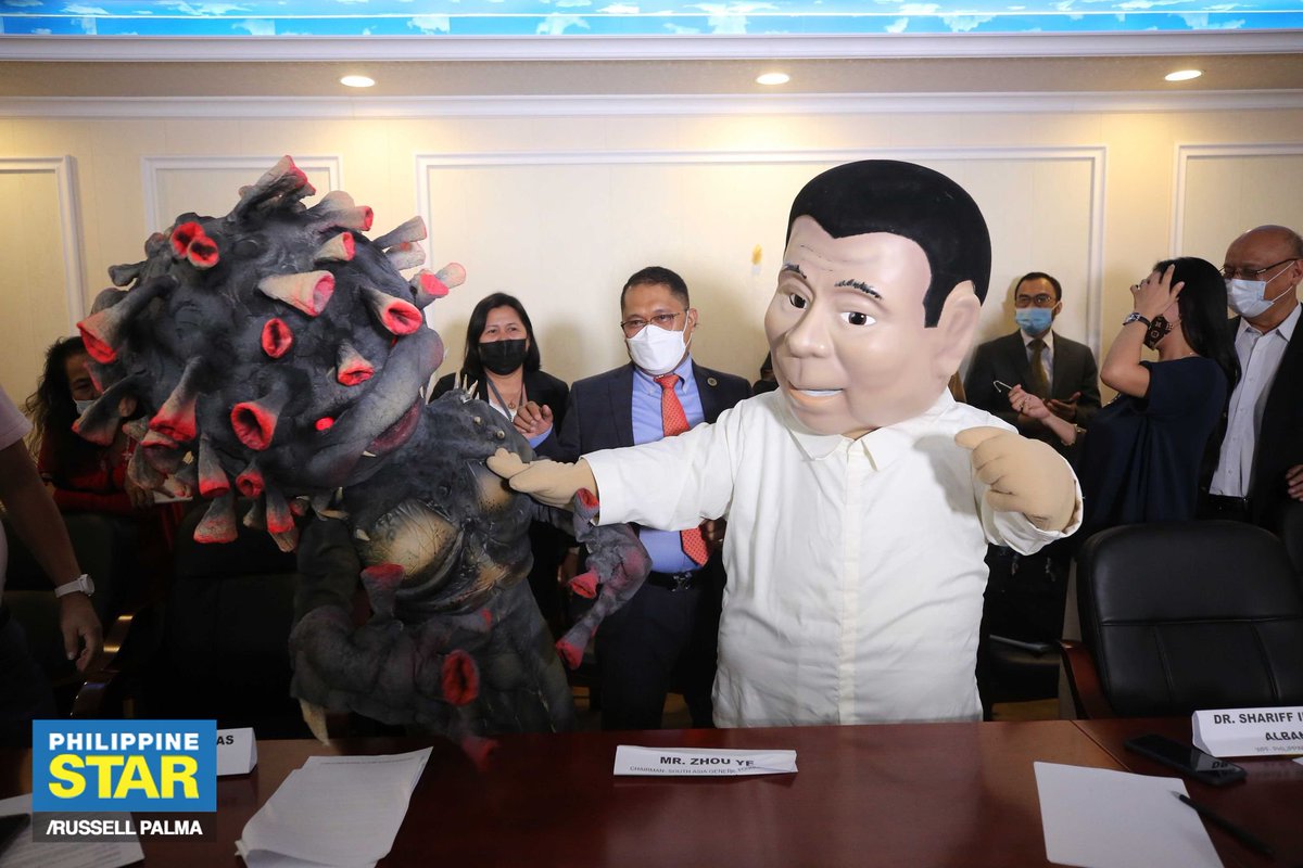 onenewsph's tweet image. A mascot of Pres. Duterte punches a COVID-19 mascot on Wednesday during a press conference pushing for free COVID-19 vaccination. 👊🤜🦠

(via @PhilippineStar)
