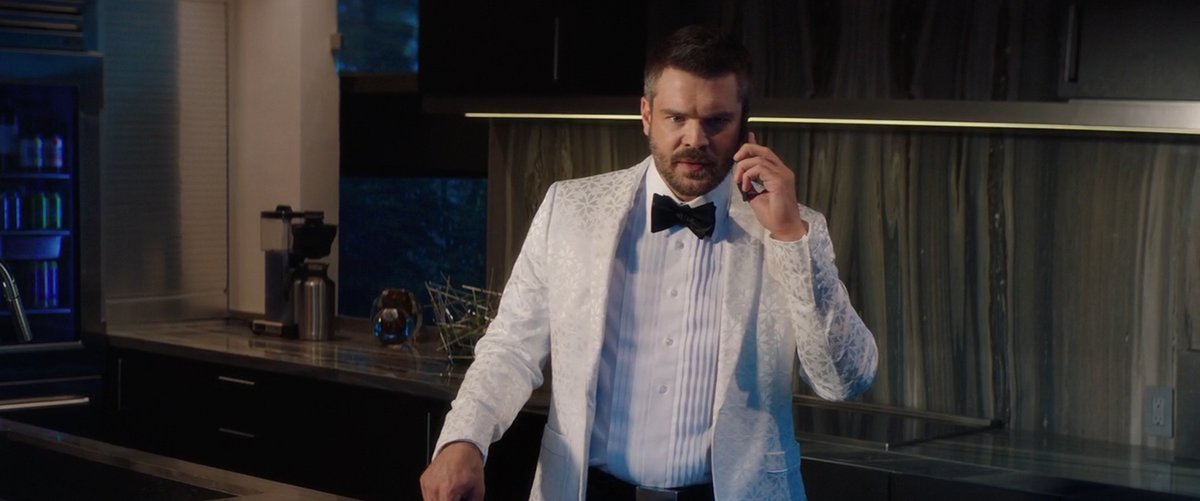 charlie weber in a white suit 