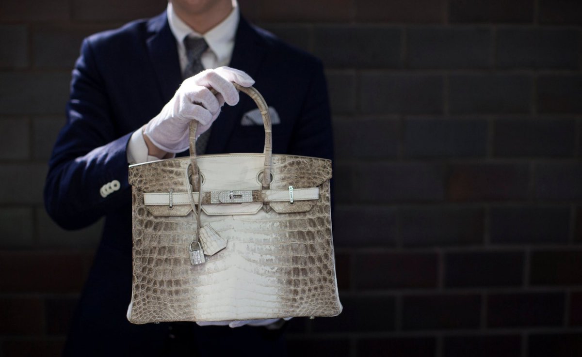 The most expensive handbag ever sold at an auction was the Niloticus Crocodile Himalaya Birkin 30. It’s made of rare, almost-albino crocodile skin with 242 diamonds on its 18-karat gold hardware.It was auctioned off for 2.98 million dollars.