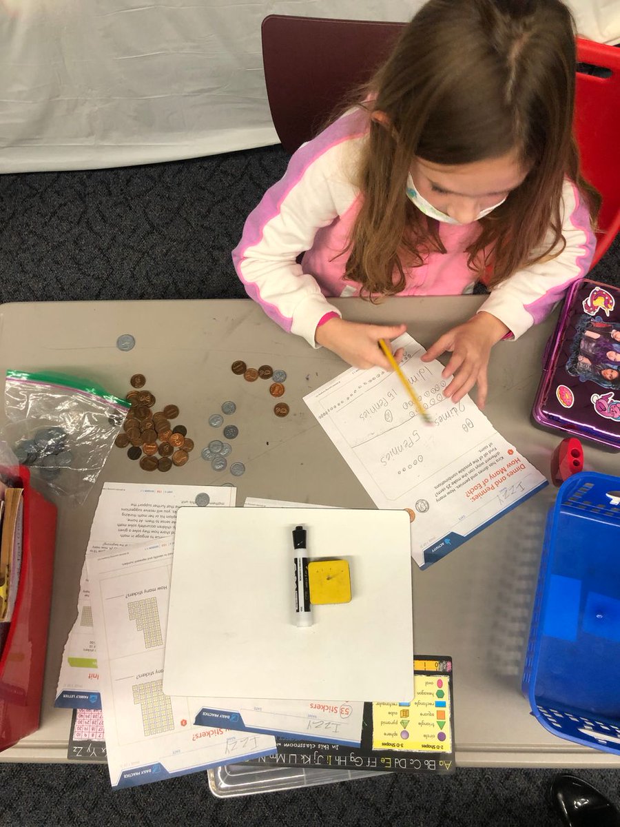 SMFSchools's tweet photo. How would you make 25 cents only using dimes and pennies? Mrs. Augustine’s class counted out 25 pennies for their method! #MoneyCounting #SMFSafe #BuildingBetterBulldogs https://t.co/sJwtK78DNe