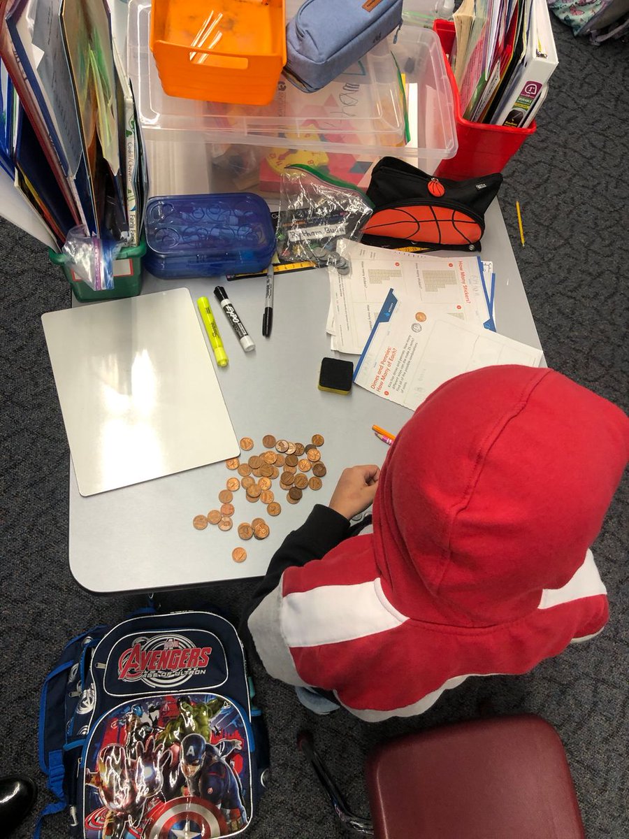 SMFSchools's tweet photo. How would you make 25 cents only using dimes and pennies? Mrs. Augustine’s class counted out 25 pennies for their method! #MoneyCounting #SMFSafe #BuildingBetterBulldogs https://t.co/sJwtK78DNe
