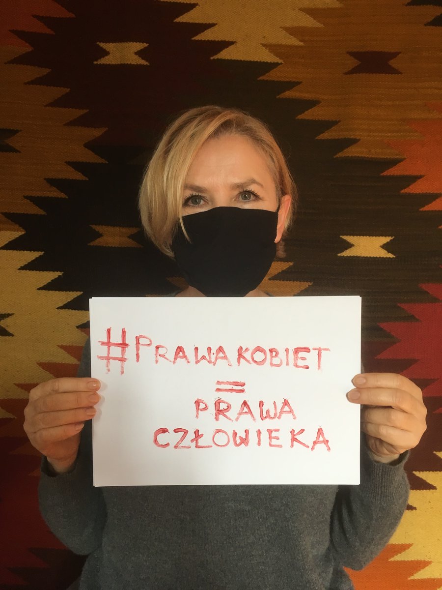 GJasienska's tweet photo. Women in Poland are on strike today protesting against a new, cruel anti-abortion law. My message on a card  "women's rights = human rights". Please support Polish women. https://t.co/FOrYjLccq8