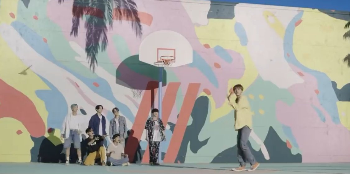 + wall behind namjoon and yoongi (and later on behind all of the members together). The colors are similar but they could be the pastel shades to match the whole MV theme. I don't think it's just a coincidence.