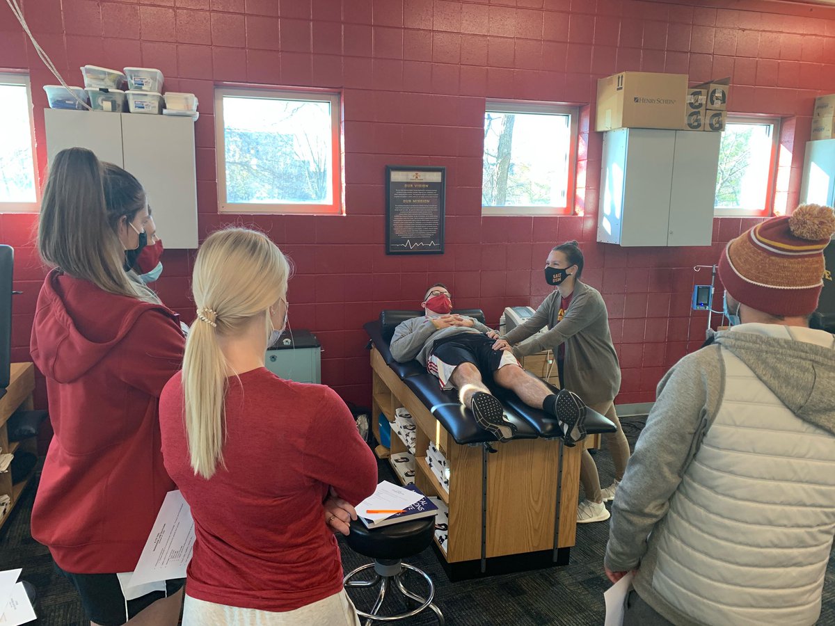 CyclonesAT's tweet photo. Iowa State athletic training alumni and current massage therapist Emily Robinson demonstrates various techniques with first year graduate students in the therapeutic modalities class https://t.co/TxD8Bpt5qN