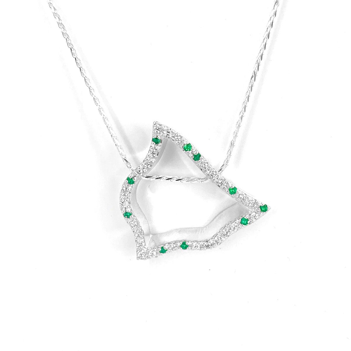 MarmadukeDesign's tweet photo. The new Triangle Wave Pendant with diamonds and emeralds is here! Completely unique and beautifully designed to become someone’s favorite statement piece ✨ #meredithmarmadukedesigns #customjewelry #jewelry #pendants #diamonds #emeralds #statementpiece #luxury #fashion #unique https://t.co/nGuO5ZqlRs
