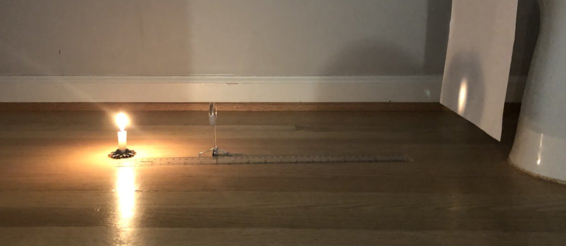 MsFusinaChem's tweet photo. Physics students had to get creative to create their own optical benches at home to study the real images being projected using a magnifying glass, a candle, and a meter stick (plus whatever other tools they used to make those things stand up!) @SSSASsaints #PhysicsEd #LensLab https://t.co/FRxhI1w1Sq