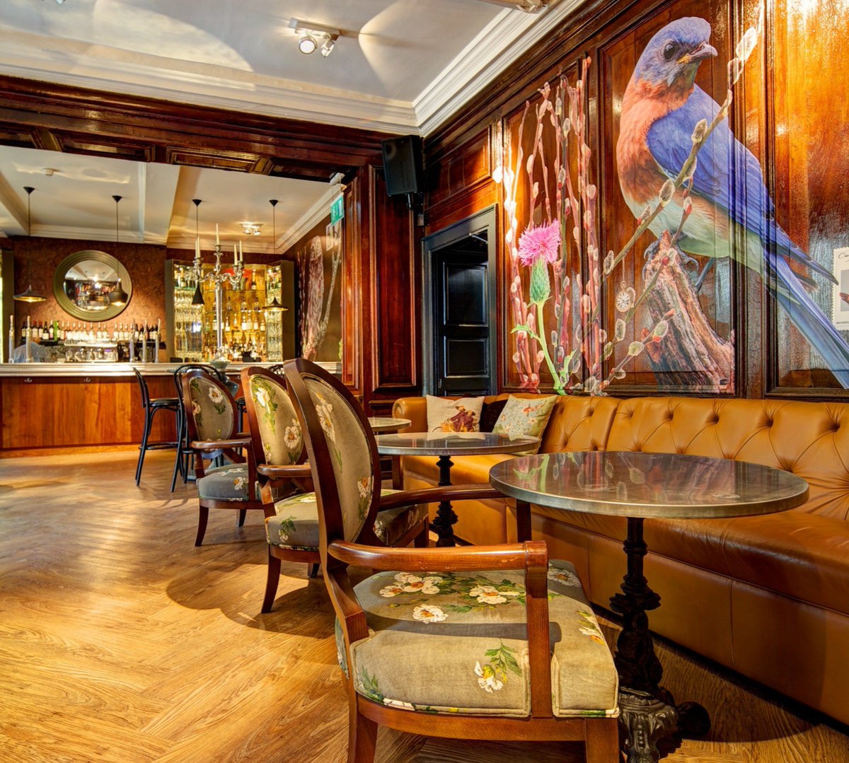 We take the inside out in our secret garden and the outside in, with our woodland fresco in our cosy panelled bar