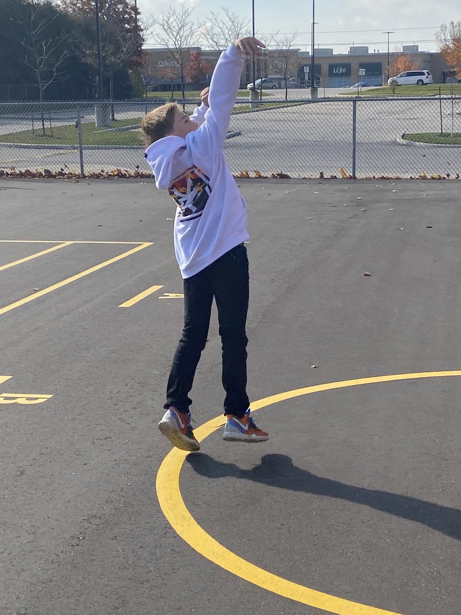 sjfgator's tweet photo. Whether it’s practising a volleyball serve, shooting some hoops or just chilling in front of falling autumn leaves, it’s great to be at school and out in the fresh air.  #autumnleaves #HereIam https://t.co/ErXx921MJR