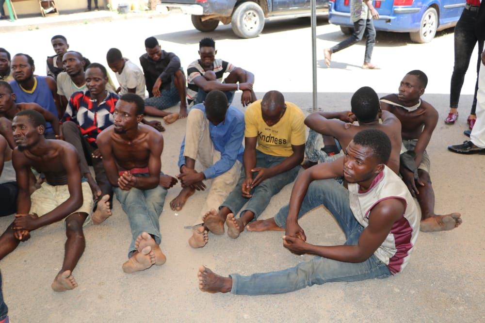 daily_trust's tweet photo. The police in the FCT put on parade suspects arrested for looting as ENDSARS protests got out of hand and left room for hoodlums to invade public and private warehouses in Abuja. https://t.co/duEXVGDOTu
