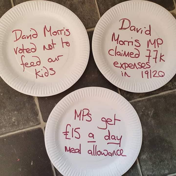 before_profit's tweet photo. Feed Hungry Kids! #EmptyPlateProtest outside the office of David Morris Conservative MP for Morecambe & Lunesdale. He voted against extending free school meals. 100s of families in Morecambe rely on food banks. In 2019-20 he claimed over £77,600 in expenses. #PeopleBeforeProfit https://t.co/dqrXLAyb7O