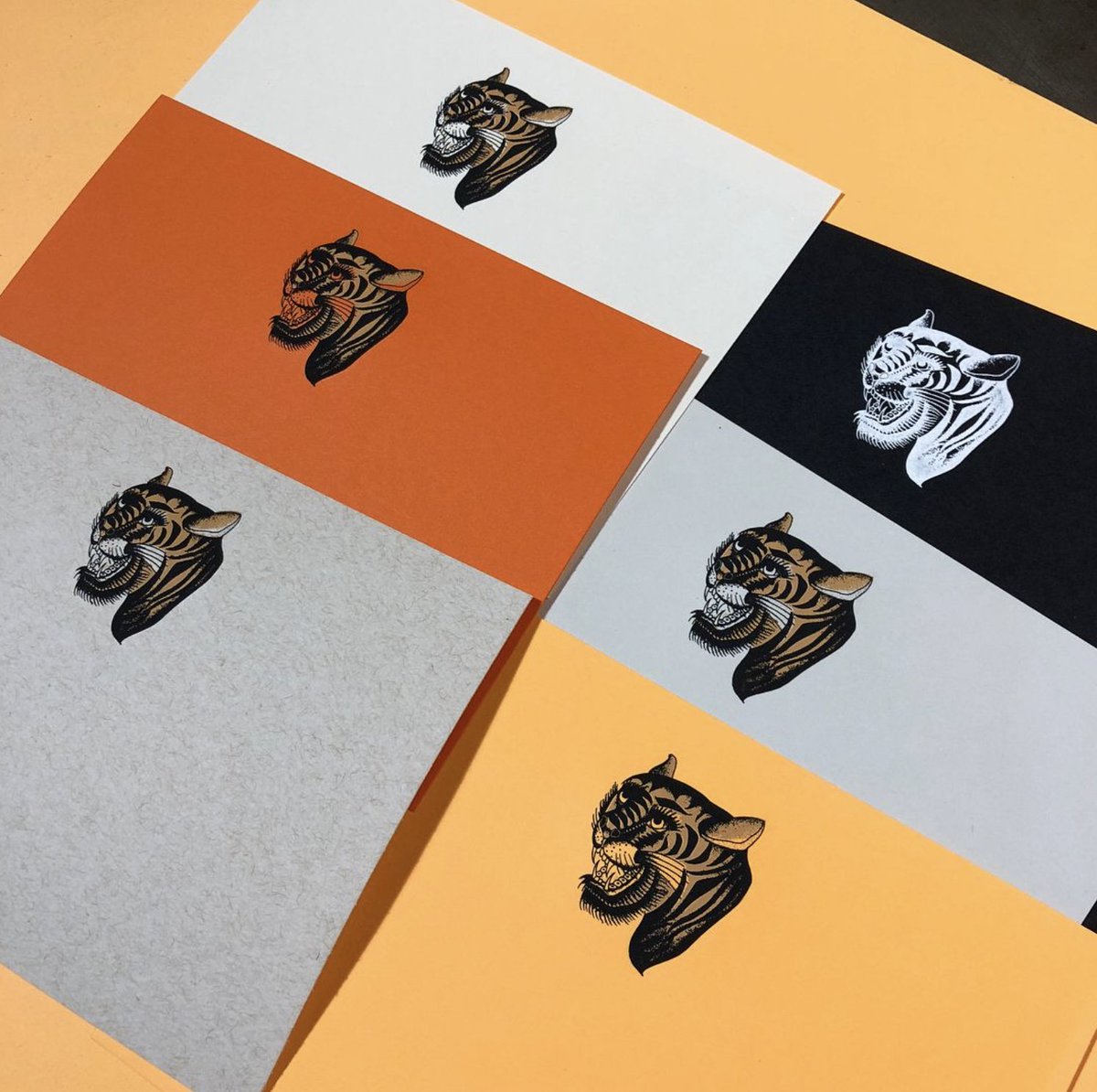 mohawkpaper's tweet image. Printing on #coloredpaper can transform your work.
.
Check out this #engraving demo printed on various Mohawk sheets of a #BertGrimm tiger that he illustrated and etched into a copper plate. The paper choice really influenced the illustration in an unexpected and memorable way.