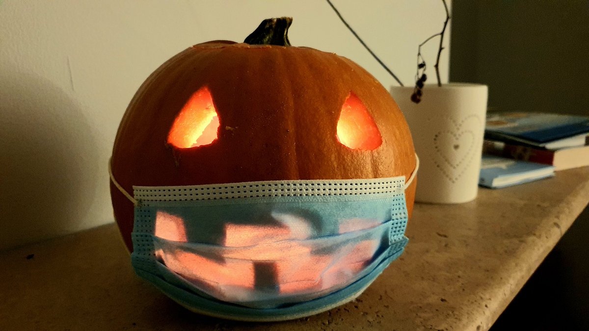 Pumpkin with a face and a facemask
