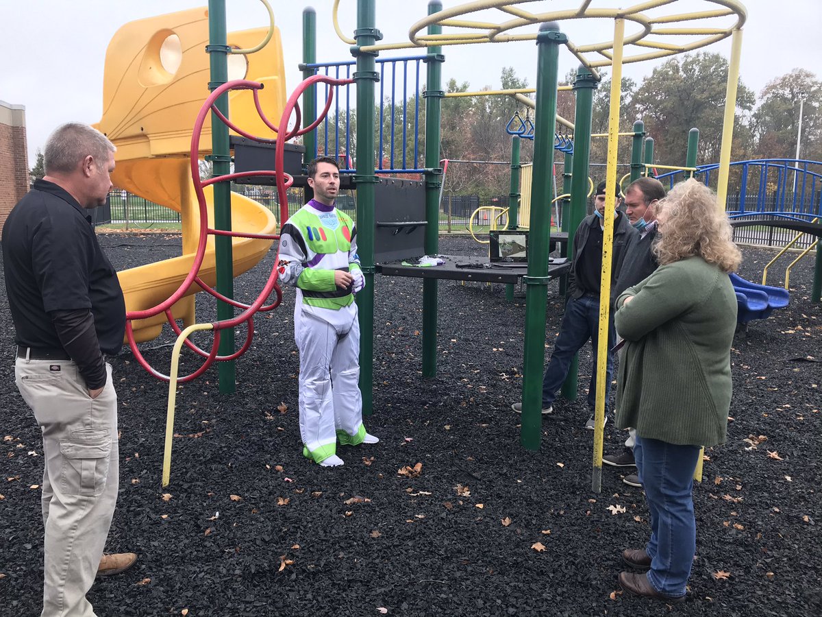 When your elementary principal conducts a meeting with the playground equipment company in his Buzz Lightyear costume.