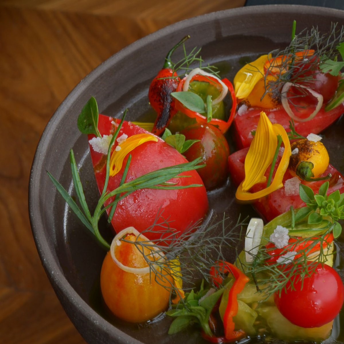 Lexus's tweet photo. We’re proud to introduce Executive Chef Nick Martinez as the newest #LexusCulinaryMaster. Try making his recipe for Heirloom Tomato Salad in the Lexus global digital cookbook, Culinary Perspectives, and let us know how it goes. #LexusCulinary https://t.co/yJqWxmDMOl https://t.co/eFKMm8MfRj