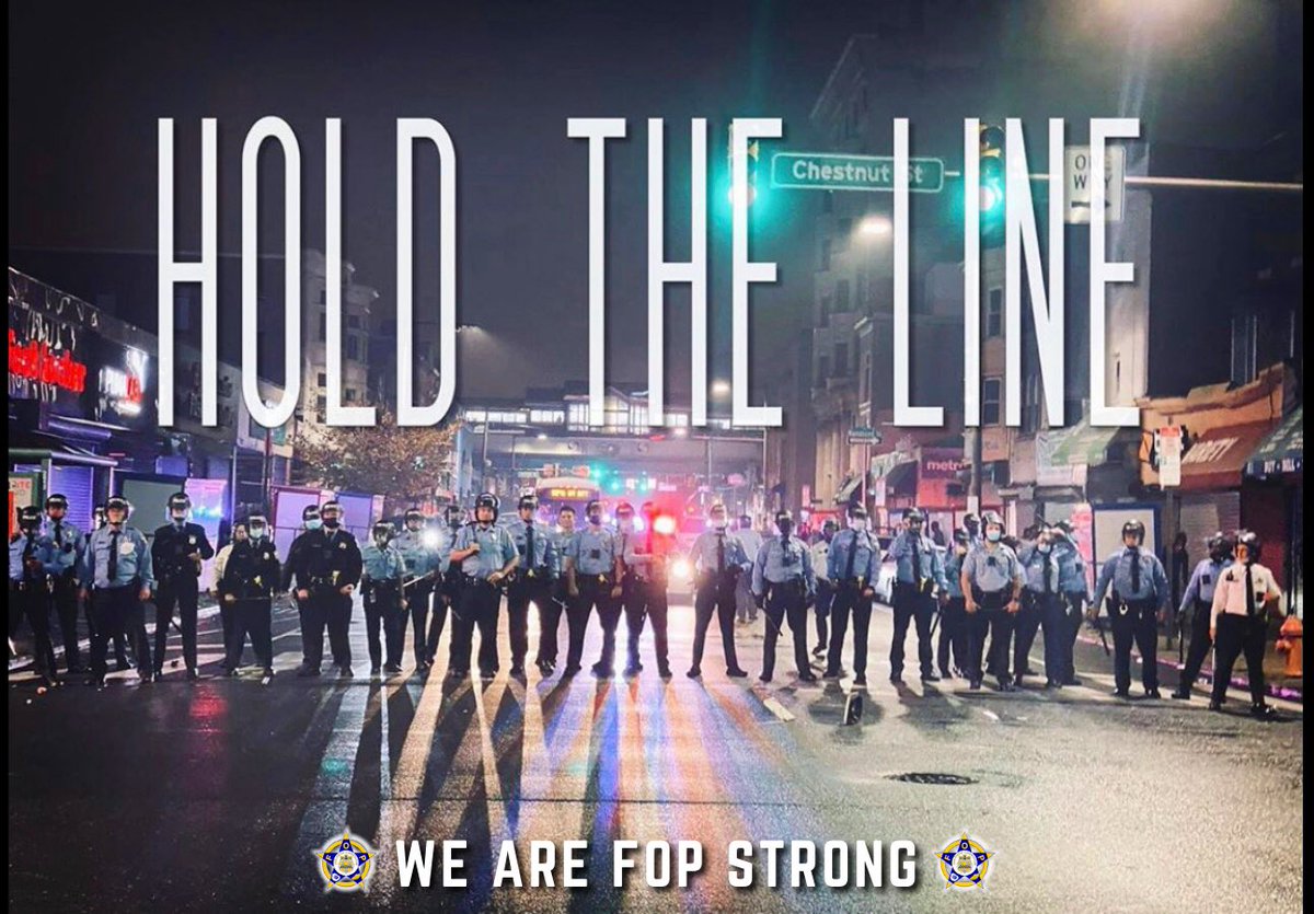 Philadelphia Police Officers Holding The Line During a Night of Violence and Lawlessness