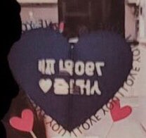 following the premise that this was taken using the selfie/front/mirror camera, why is the statement in the heart card not flipped (1st pic)? why is it written properly? if the photo was taken using a front cam the writings should’ve been like this (2nd pic)