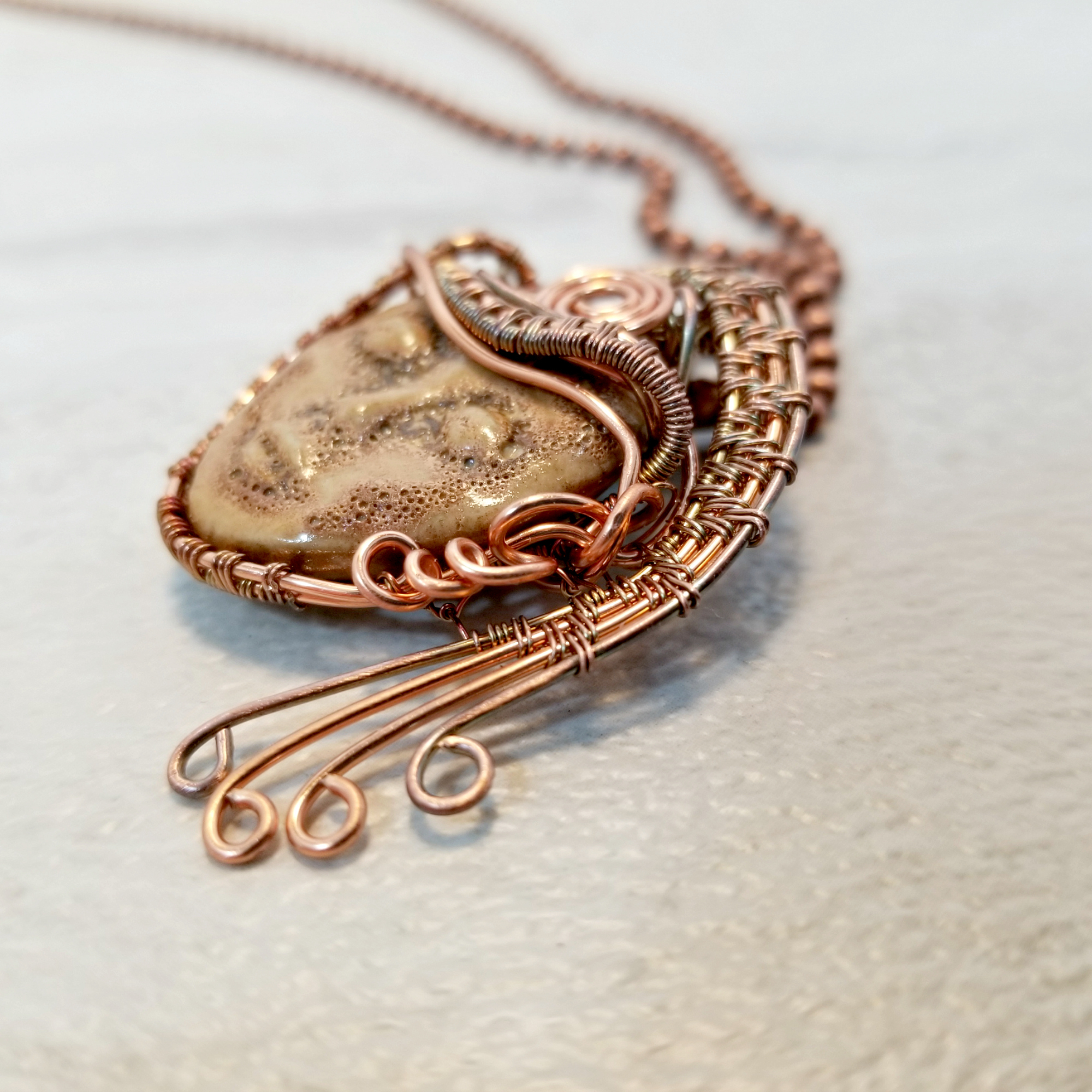 A handmade copper wire wrap pendant with a moonstone cabochon. Selene moon goddess