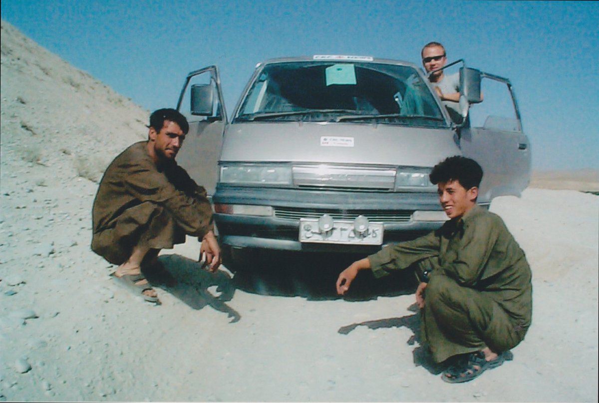 A year after Afghanistan (and a buzz cut from a soldier -- big mistake) came Iraq. What a fascinating, cultural rich nation that would soon experience horror. This is outside Saddam's Palace in Tikrit with the legendary Patrick Brown and videograoher Glen Kugelstadt 2/4