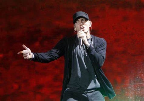 DrakeOstrich's tweet photo. Eminem is the first rapper to go PLATINUM in 4 different decades and has the best selling hip hop album of ALL TIME! Add numerous #1 albums under his belt and you have yourself the 🐐 https://t.co/kaSKwaSJ3E