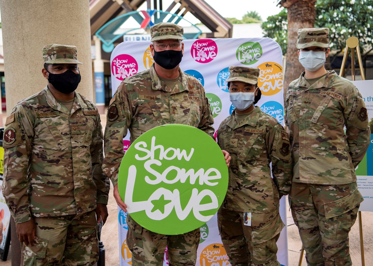 U.S. Air Force Lt. Gen. Jon Thomas, center, Pacific Air Forces deputy commander and Combined Federal Campaign Chairman for the Hawaii-Pacific region, poses for a group photo with Staff Sgt. Nathaniel Robinson, left, Senior Airman Victoria Branch, center right, and Staff Sgt. Fabiola Rosin, Joint Base Pearl Harbor-Hickam, Hawaii, Oct. 27, 2020. Thomas highlighted the importance of the CFC to service members and civilians. (U.S. Air Force photo by Tech. Sgt. Zach Vaughn)