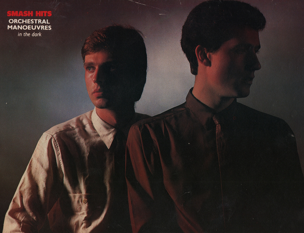 OMD40_'s tweet photo. And last but least on the back cover of the new issue of Smash Hits, out #OTD in 1980, there's a full colour poster of Paul Humphreys and Andy McCluskey aka OMD, all smart and moody, and looking cool on your bedroom wall! (scan @BrianTV) #OMD40 #Organisation40 #SmashHits https://t.co/yWvRzoN684