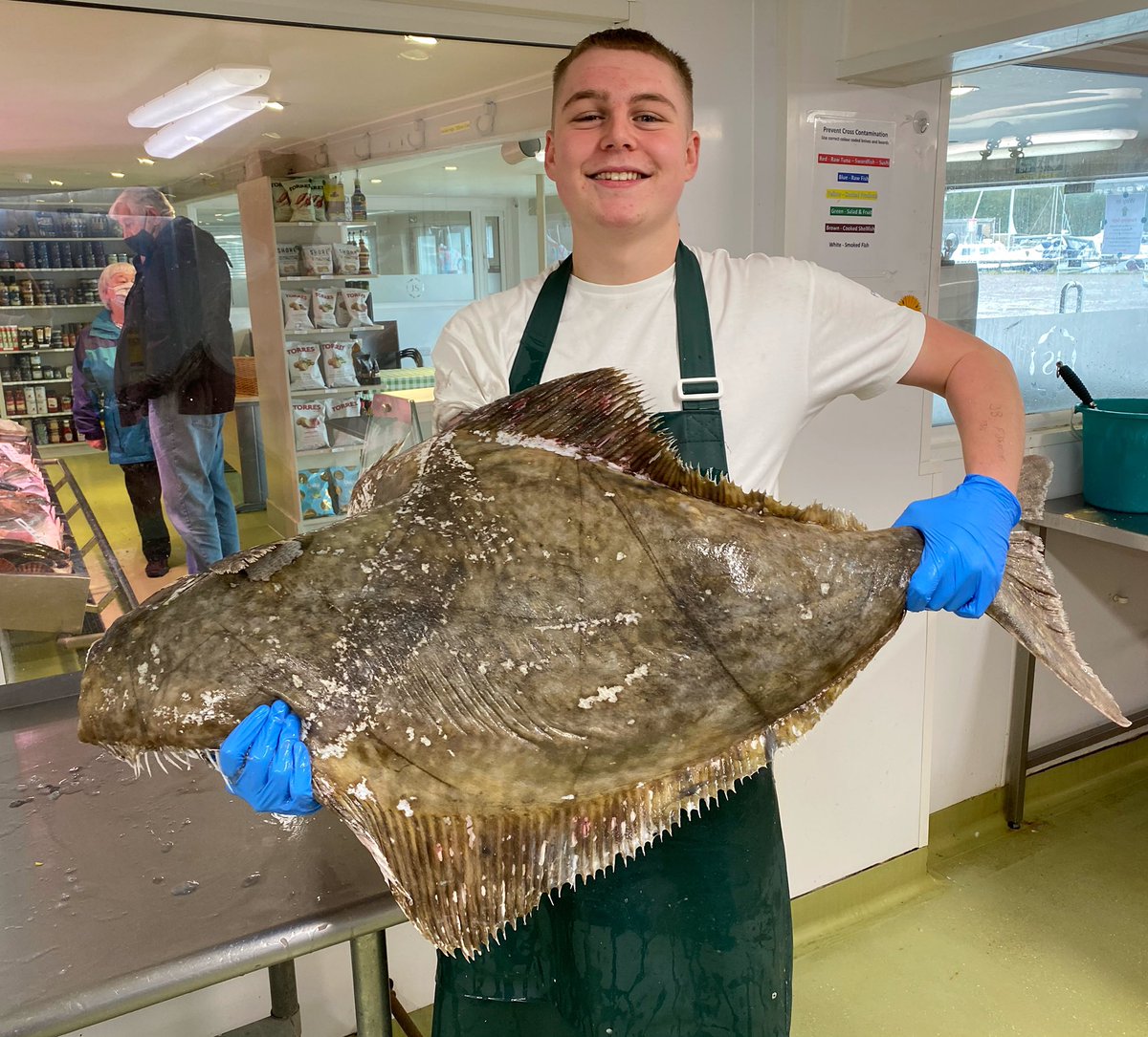 sylvia75817198's tweet photo. Here’s Robbie this morning with a whopping great 23kgs of lovely Halibut! Get your orders in for the weekend, don’t forget we do home deliveries if you need them. 🚛🐠🦀 https://t.co/vjG9wqVGSY