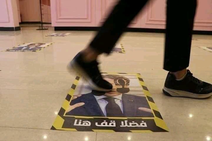 abdul_karimH's tweet photo. Macron's picture is used for social distancing in malls in Tripoli,Libya https://t.co/2adH3Tsn1F