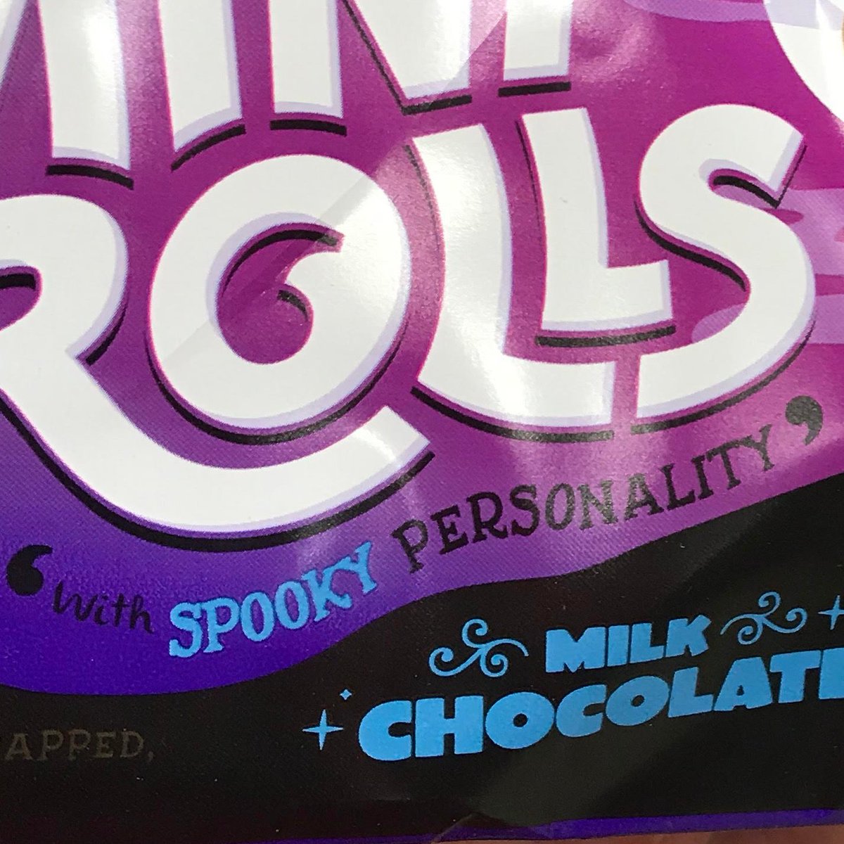 CADBURY MINI ROLLSEven by the rock-bottom standards of spooky products, this is low-effort: no halloween change whatsoever to the appearance or taste. I see they've even put "with spooky personality" in inverted commas, presumably to get around trading standards. Disgusting /5