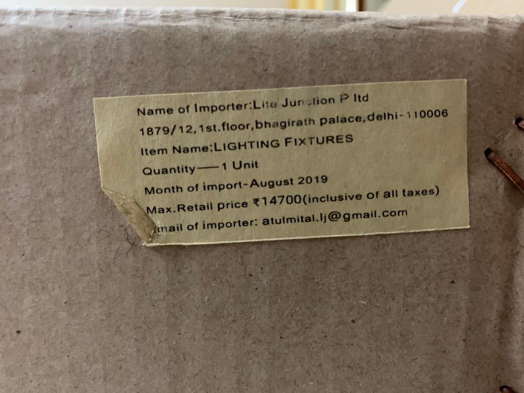 Horroromantic's tweet photo. I bought this Chandelier product from @amazonIN whose original cost showed ₹24,999 on the website. After the delivery was made, the MRP on the box of the product was only ₹14,700. When I tried reaching to @AmazonHelp , They said sorry (1/2) https://t.co/FJrqvlH0UP