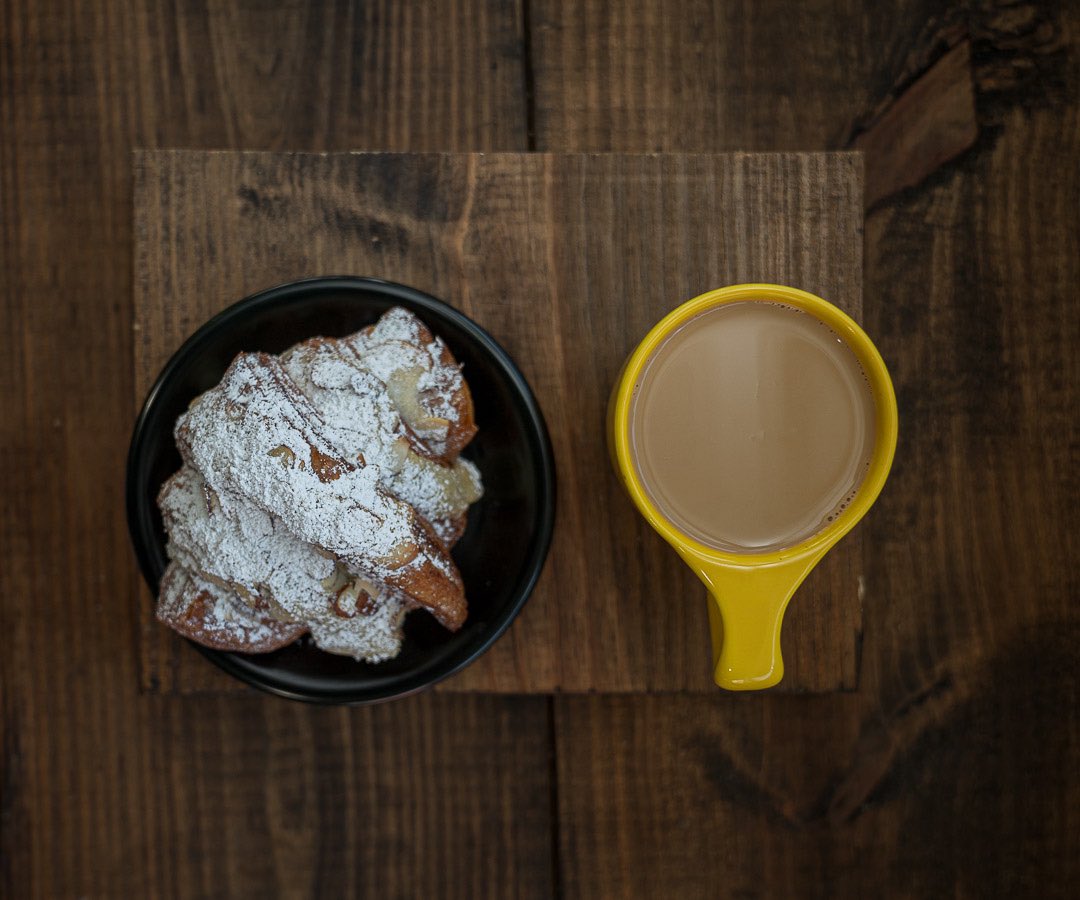 Almond Croissant and our daily blend with a little cream. The perfect combination! #blackcoffee #fortworth  #dfwcoffeeshops #coffee