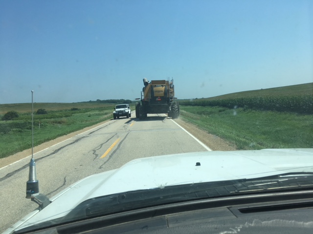 iowadot's tweet photo. Passing large farm vehicles can be tricky. Please slow down and use extra caution. Soft shoulders may make it difficult for the farmer to pull over and allow you to pass, so be patient. https://t.co/7GJ73XYTeY