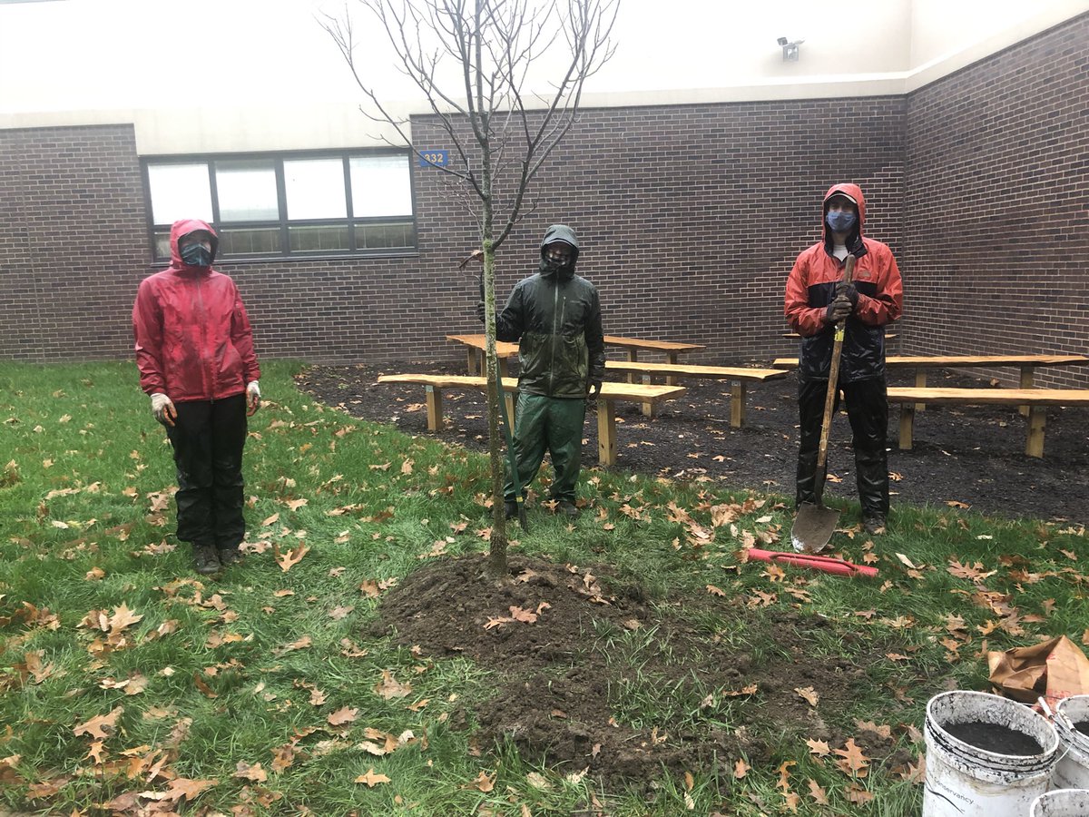 krishupp's tweet photo. Special thank you to Ryan, Marah, & Matt from @WaterLandLife for braving the cold and rainy morning to add a witch hazel and serviceberry tree to our outdoor learning spaces. #STEAMCatalyst @transformED_aiu @remakelearning https://t.co/1jtSNU1wOC