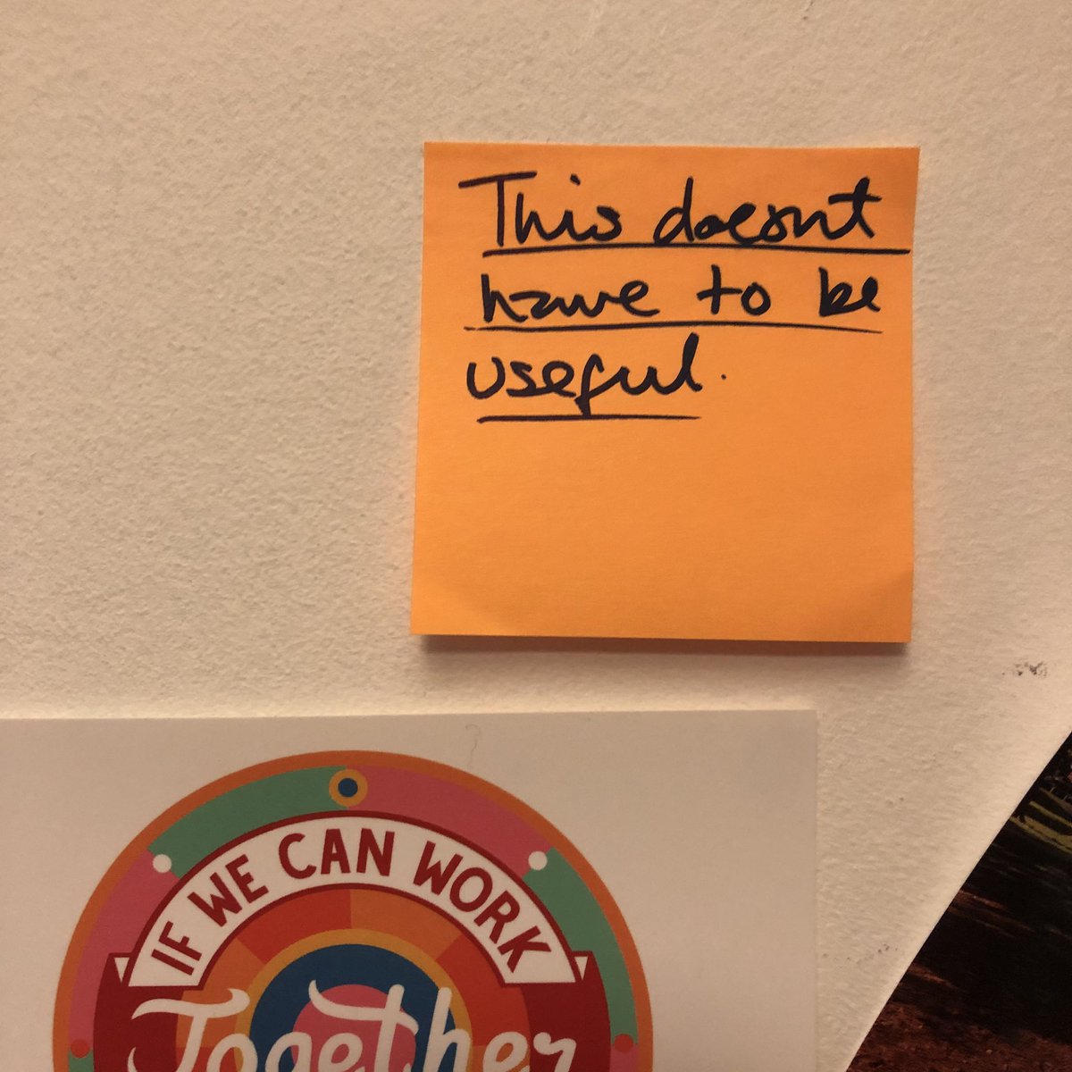 A post-it says “this doesn’t have to be useful”
