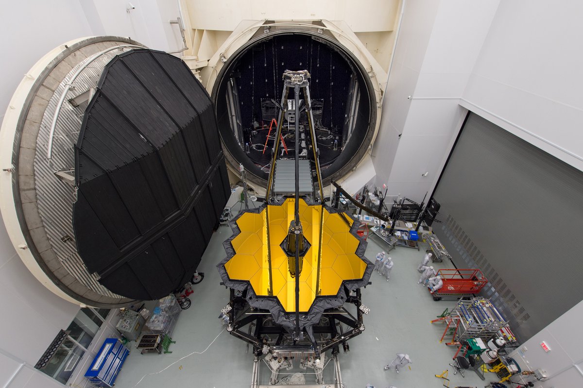 NASA’s James Webb Space Telescope sits in front of the door to Chamber A, a giant thermal vacuum chamber located at NASA’s Johnson Space Center. Credit: NASA/Desiree Stover