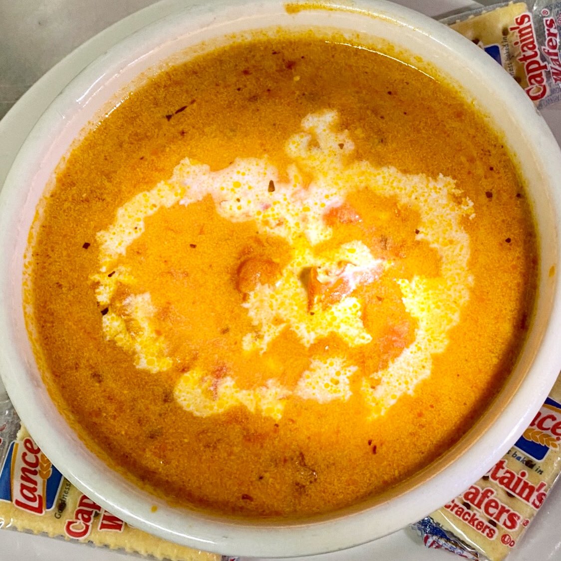 ManagerFlo's tweet image. Spicy tomato bisque with chicken at Columbia’s Downtown today 🍲