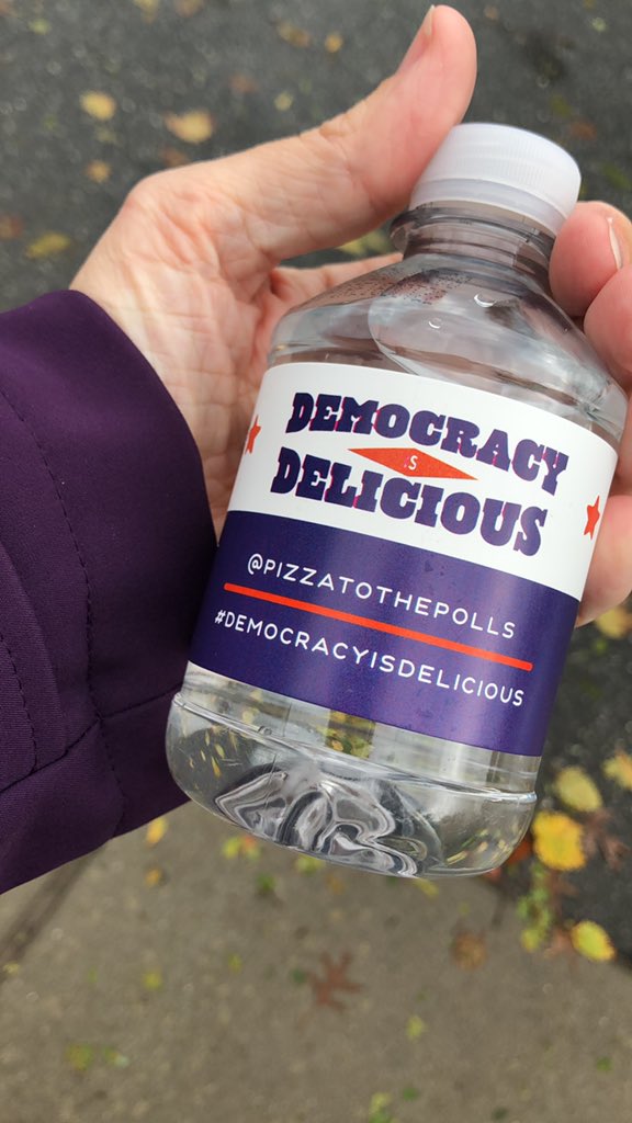 juliecfilm's tweet photo. Shout out to #democracyisdelicious, keeping people in line and feeding hungry voters for free here in #greensboro! #EarlyVoting #hungryvoters @pizzatothepolls #pollgreeter https://t.co/otu57l4l9J