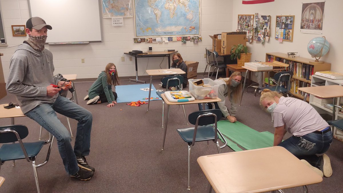 NHSRAHS's tweet photo. NHS and @rahs_studco members working on the food drive poster. Bring nonperishable food items to the box in the commons until Oct. 30th! https://t.co/Rft3Z9iMxu