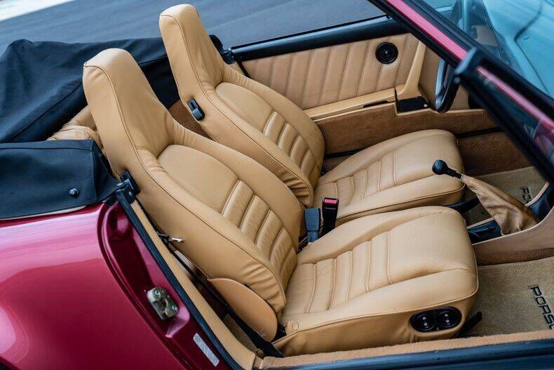 porschelife31's tweet photo. This 1989 #Porsche 911 Carrera Cabriolet is finished in a beautiful Velvet Red over a Cashmere leather interior with a matching top. It has 113k miles and is sitting on a set of three-piece BBS wheels. #Classifind

▶️ https://t.co/BotRkXAHs4 https://t.co/VUDSNXPEUP