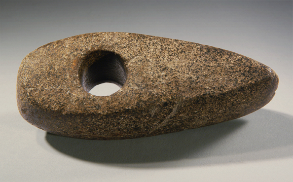 Thread: This is an example of a Neolithic shaft hammer axe...It is made of stone. A hole was drilled through it, and a shaft is fixed into it. Nothing special...Except how did they drill this hole through a stone without metal drills? Well here is how: