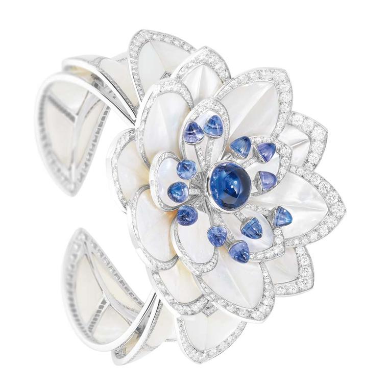 And a cuff also from Boucheron, sapphires, mother of pearl and/or opal, and diamonds. Cuff bracelet. Gimmie.