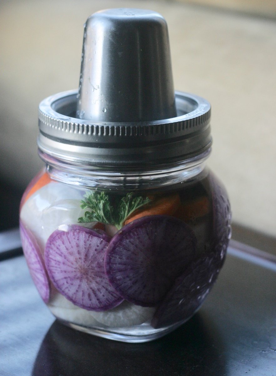 kraut_source's tweet image. Fermenting radishes and carrots. Good bacteria happening on my kitchen counter.