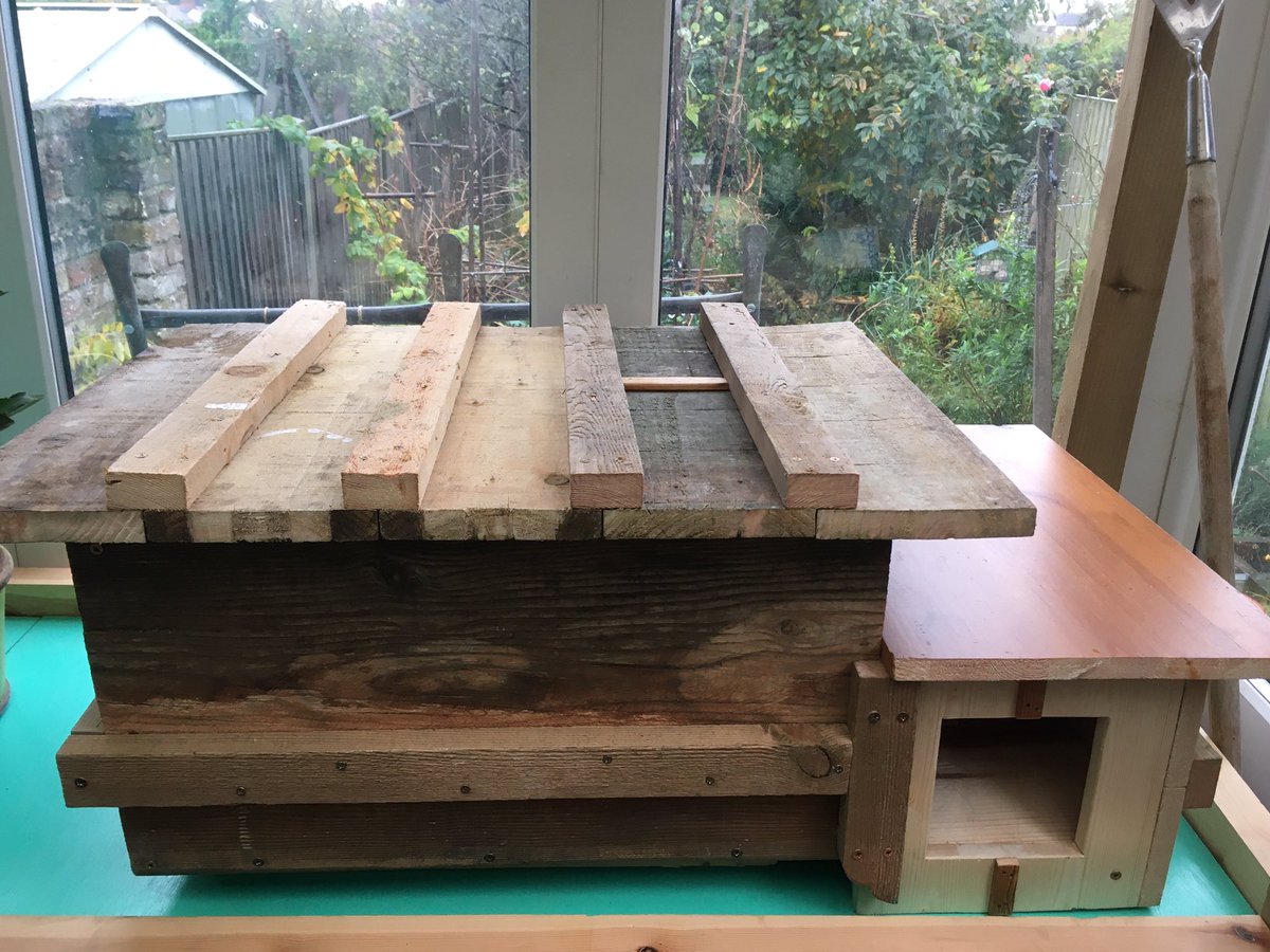 Plot7a's tweet photo. A house I built #reclaimedtimber #skipdiving #urbanrewilding #hedgehog https://t.co/aCdARQd0Gp