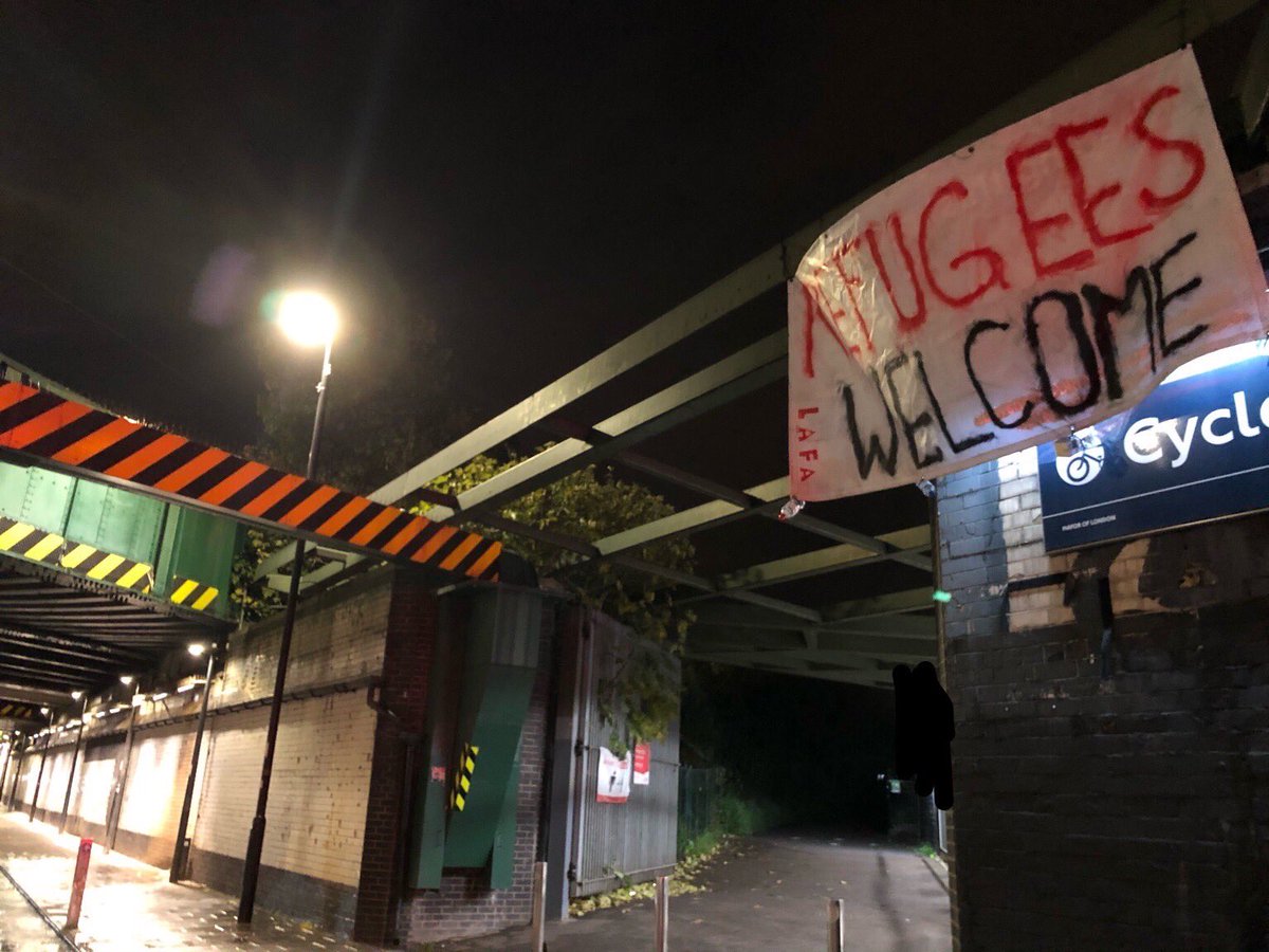 Banner showing the message “Refugees Welcome”
