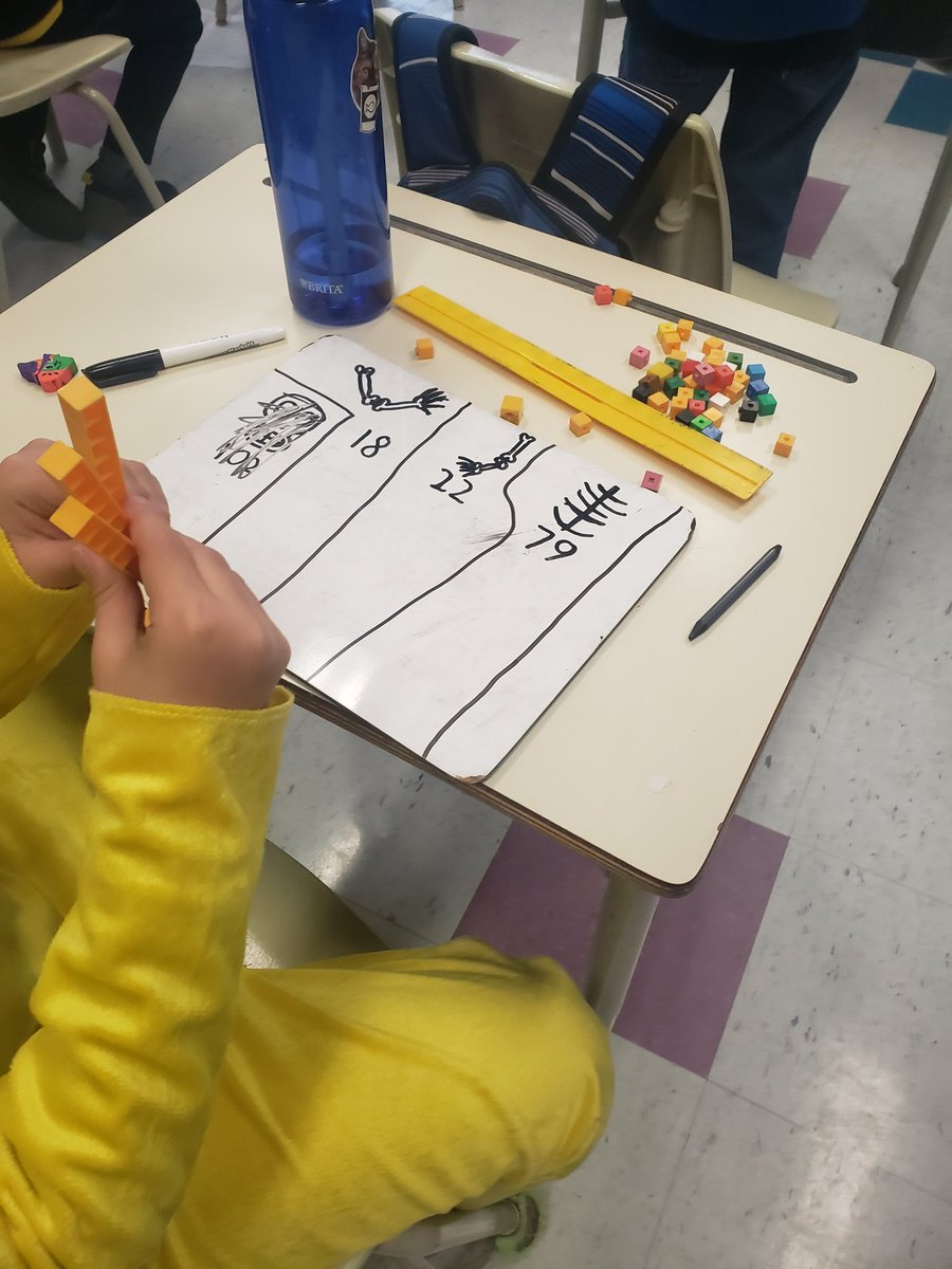 SDSymington's tweet photo. Today we worked on a stem challenge to build skeletons.  Students estimated how many base ten rods and blocks they would need and checked to see if their estimates were accurate. 
#skeletonstem
#mathchallenge https://t.co/unsYWKiZBK