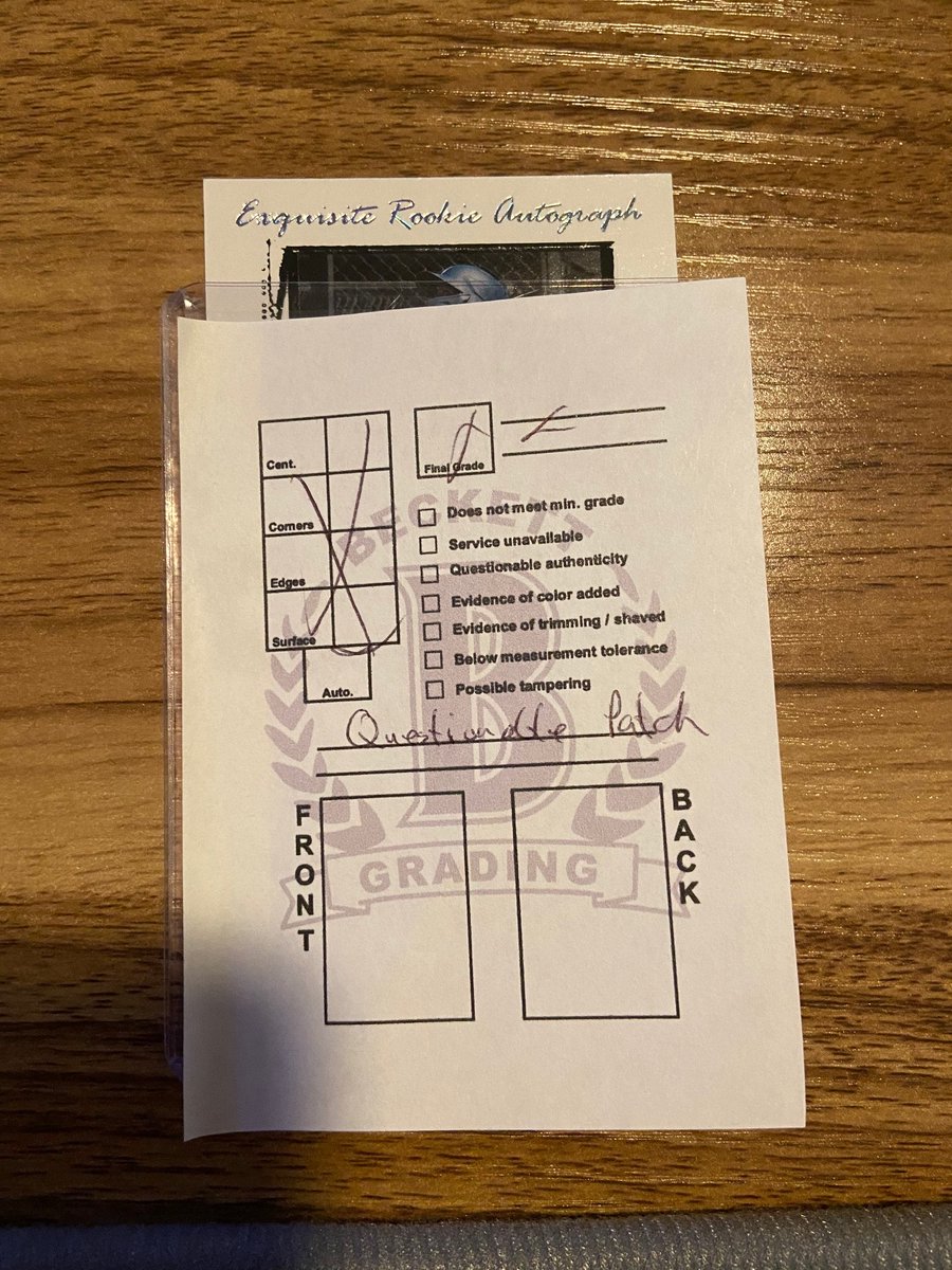 I received the card back today via FedEx with a post-it note with chicken-scratch saying "Questionable Patch". Card was packaged horribly, literally hanging out of a sleeve, and both top corners were dinged up, and one of them had pen markings presumably from the grader.