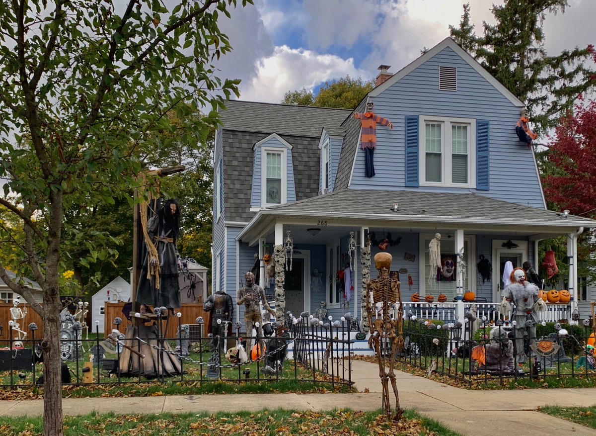 Here’s a Dutch Colonial type home, originally built in 1900, in Elgin that takes Halloween very seriously!